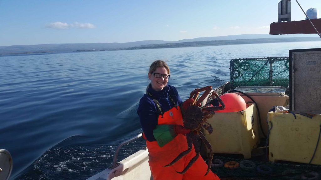 Me on deck with a Norwegian king crab in my hands.