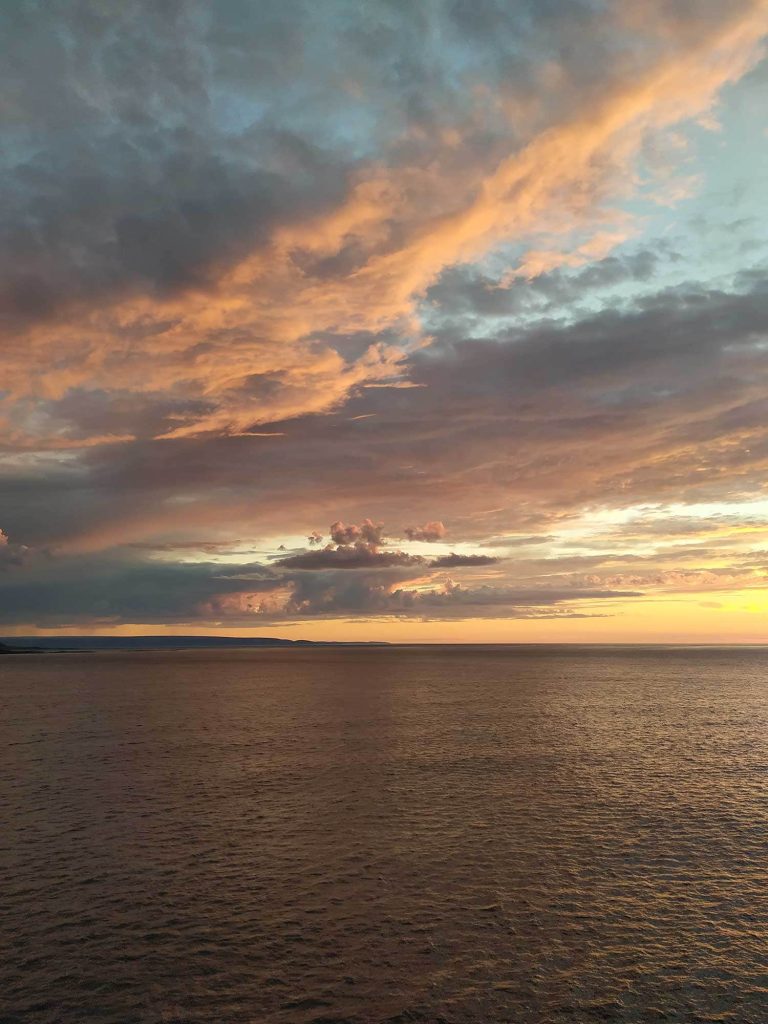 Another view of the clouds and sea in the sunset.